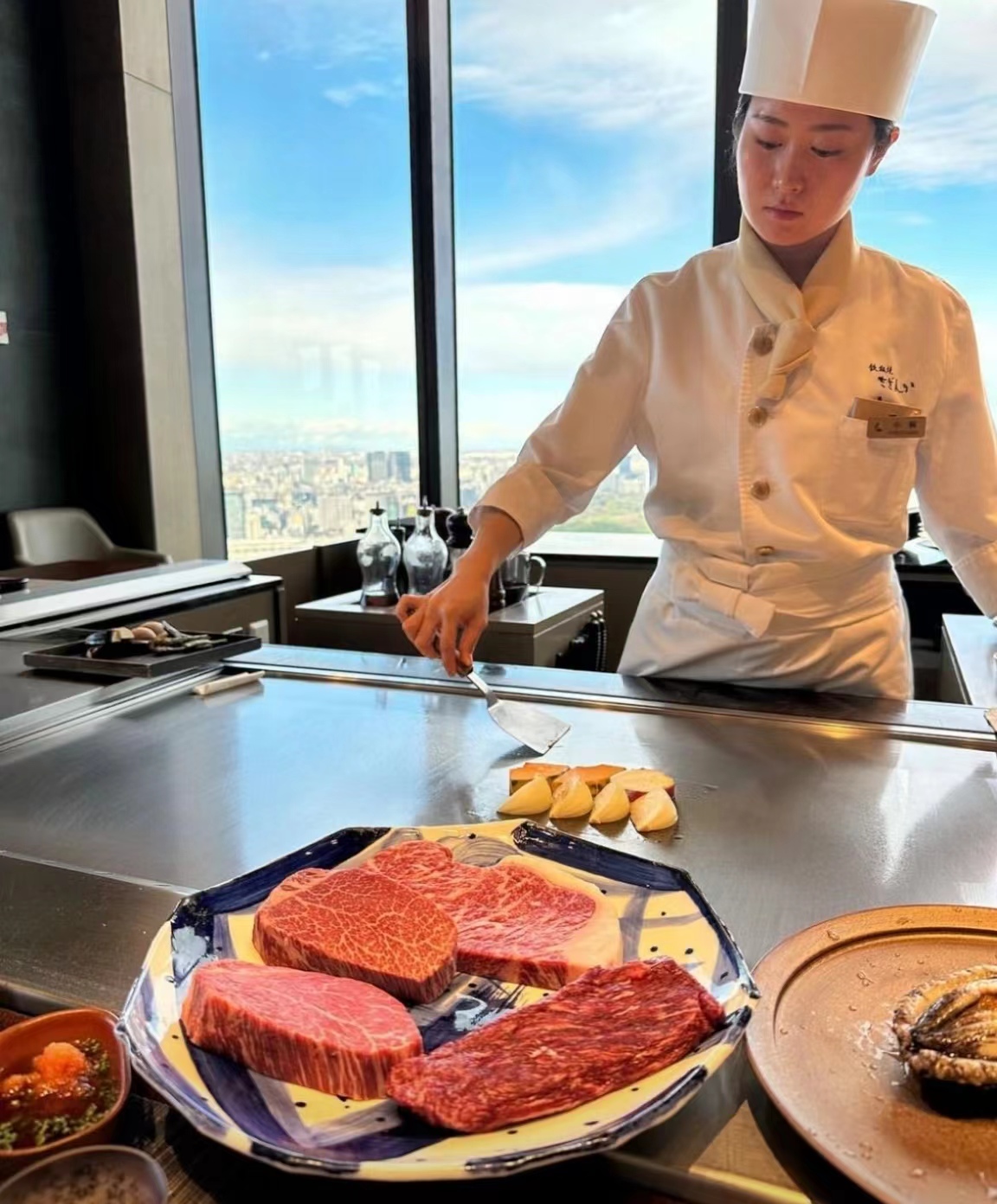 Chef working at a UCOOK teppanyaki station